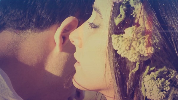 whispering something naughty on his ear